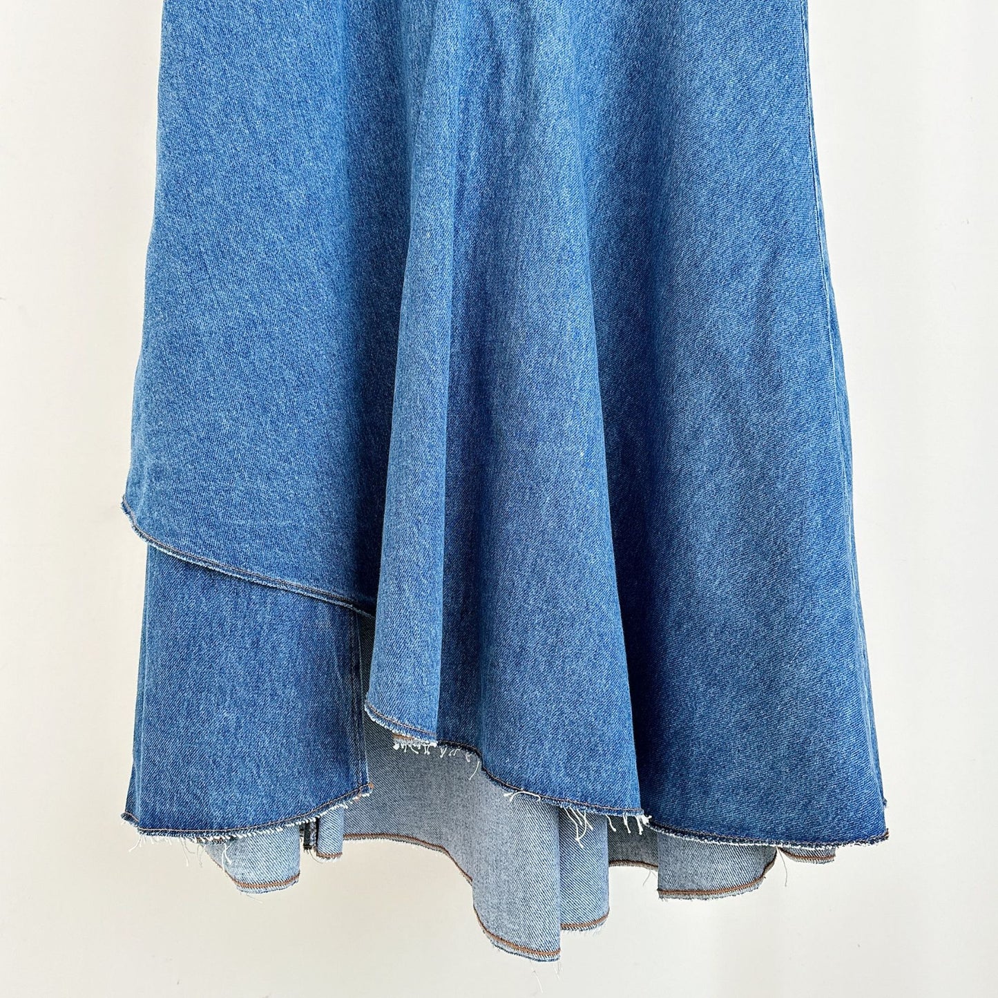 New fashion splicing blue irregular denim high waisted half length skirt for spring and summer